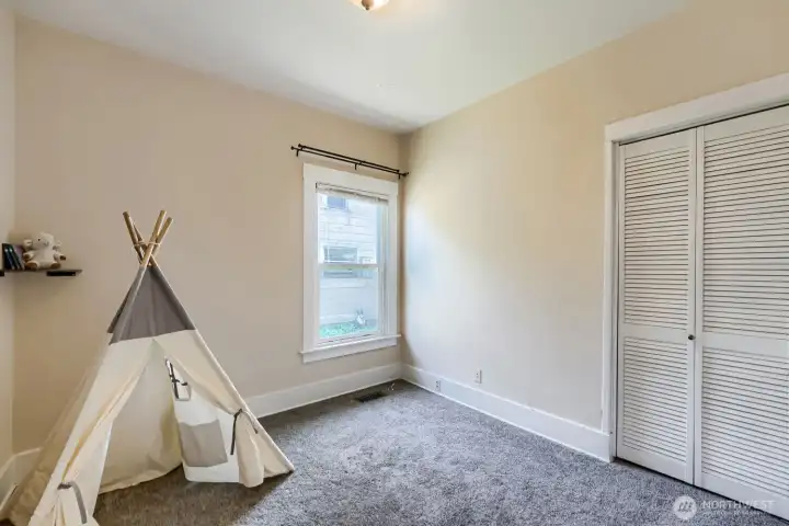 Second of the main floor bedrooms of the kitchen.