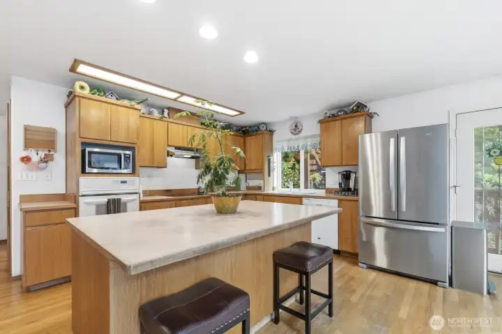 Kitchen has door leading out to massive deck Kitchen has door leading out to massive deck