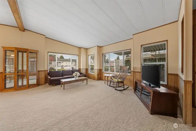 Living room and opens to dining area.
