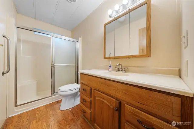 Second bedroom with walk-in shower includes two built-in seats a great way to relax.