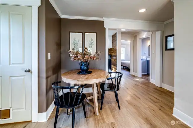 Dining Area – Perfect for meals and gatherings. The Door to the Basement on the Left