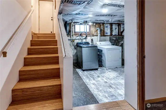 Basement with Large Laundry Room – The Door on the Left Leads to the Side/Back Yard