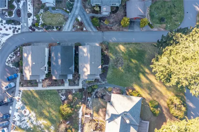 This birds eye view, shows the house and the vacant lot next door that is also available for purchasing (lot not included in current listing).