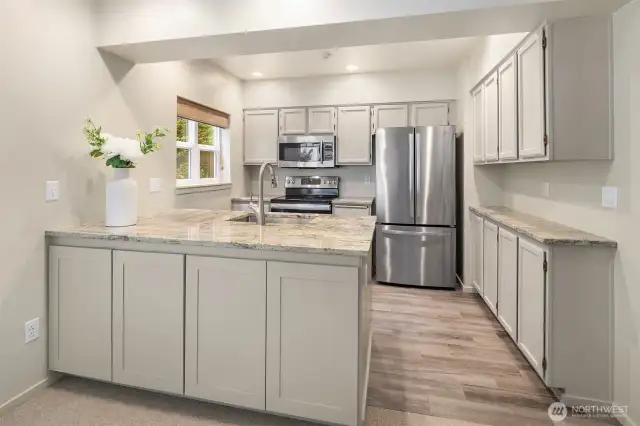 The current owners have updated the kitchen with designer touches.