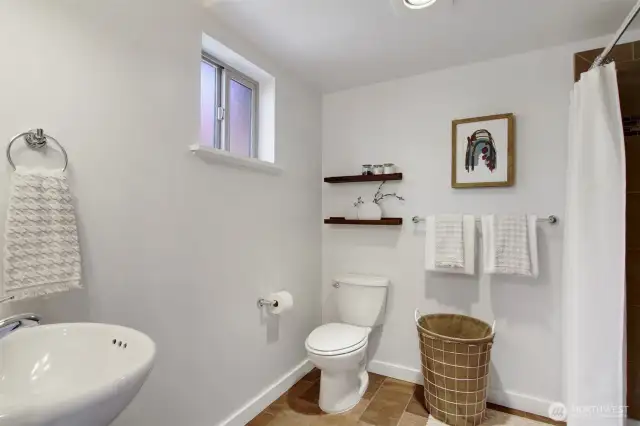 The owners loved this bathroom being on the entry level to wash off muddy paws after walks around town!