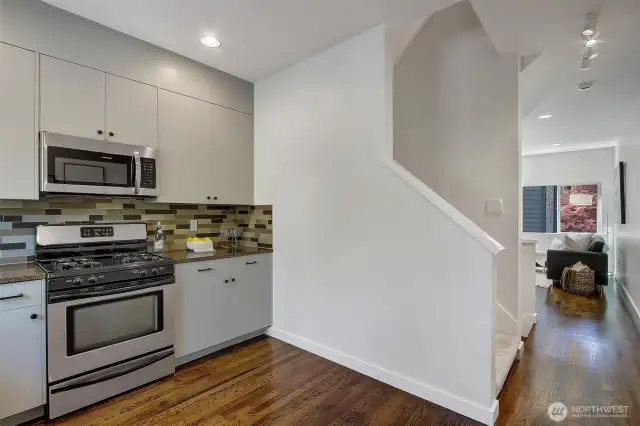 Option to add a small table, rolling island or even a peninsula that extends from the wall.