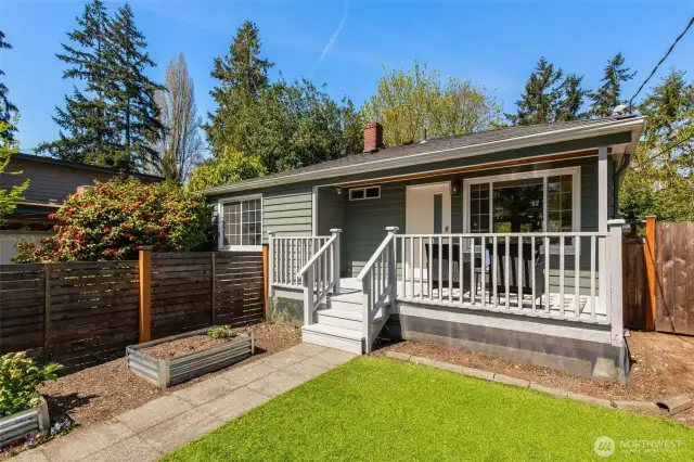 Stellar South-facing Home with Open Floor  Plan & Lower Level INCOME OPTIONS!  Serene setting on deadend strt in verdant  Victory Heights. Expansive main level: open  flow liv/din/kit for entertaining, big windows  on 3 sides light up your life, cozy 2-sided  frplc. Love this kitchen: counterspace for the  home chef to spread out & create, abundant  cabinetry, smart layout. Lower level options  galore: sep entrance = short-term rental  (rental history: 80%+ occupancy &  $105+/night), full ADU upside potential, or  retain as home theater +guest bed +home  office. AC, deluxe upstairs util room,  4-season covered front porch, fully-fenced  yard, 2 off-strt spots. Lightrail, Kraken facility,  revitaling Northgate, Maple Leaf shops, UW,  I-5 at your fingertips!