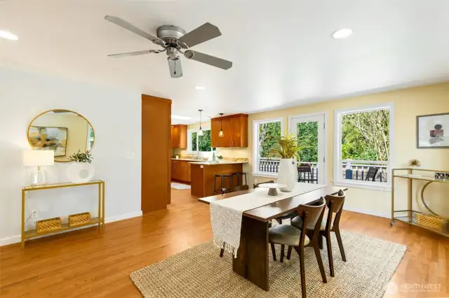 Lovely dining room with verdent, sunlit  vistas.