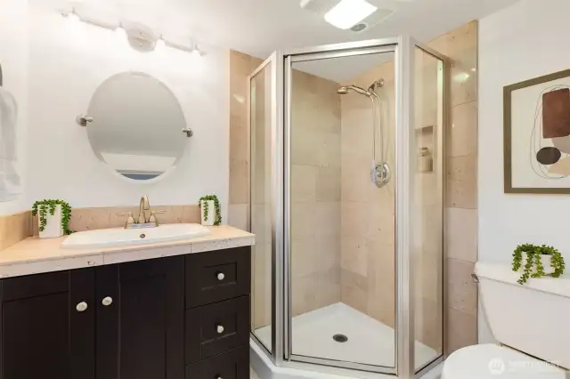 Lower level with separate entrance offers the  possibility for short term rental income RIGHT  NOW, easy upside potential as a full ADU, or  retain for a secondary rec room/home  theater + private bedroom.