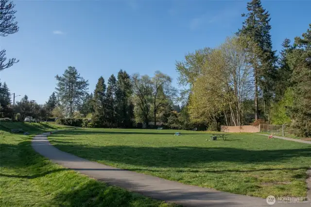 The most charming Victory Heights Park is  just a short stroll from your door! The hub of  the community - wonderful for play for all  ages, picnics, fetch, or even volleyball and  softball.