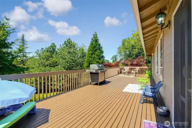 Back deck runs full length of the home