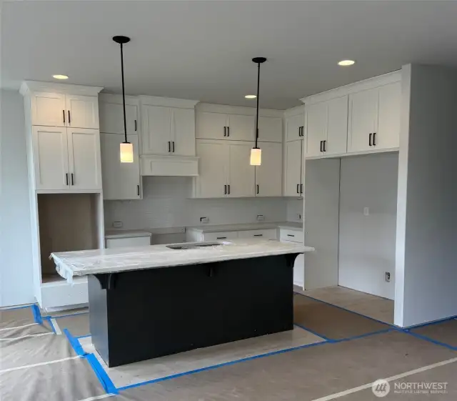 Home as of 06/25/25. Upgraded white cabinets to the ceiling in the kitchen, side by side fridge/freezer combo, and matte black hardware.