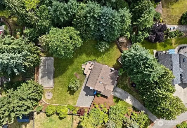 This exceptional estate is located on .56 acres, and is completely private and provides true, tranquil living.