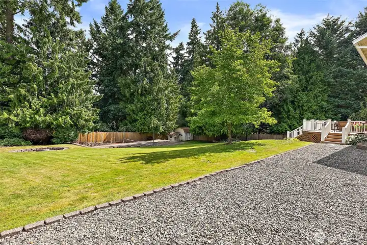 Outdoor living and entertaining at its finest for everyone to enjoy and steps away from the back deck.
