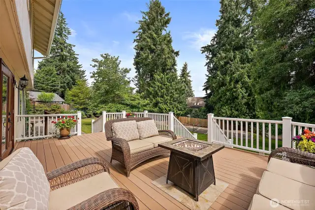 This beautiful, spacious deck overlooks the beautifully manicured 1/2 acre property...