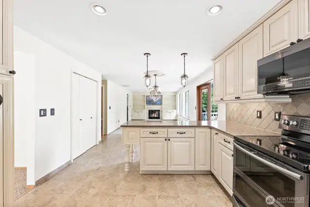 Entertainment made easy with this large and open flow from the kitchen to family room, to the beautiful outdoors.