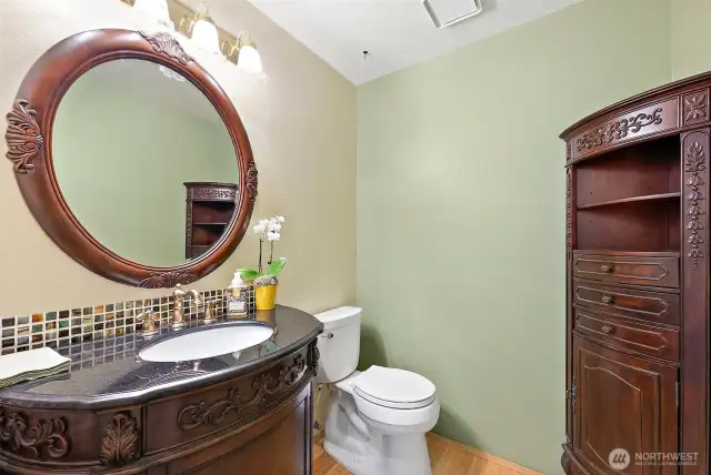 Enjoy the stylish, updated Powder Bath conveniently located on the Main Floor.