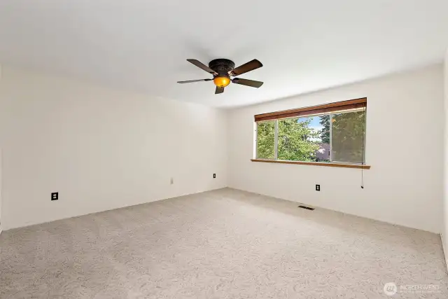 The Primary Suite is spacious, and light & bright....