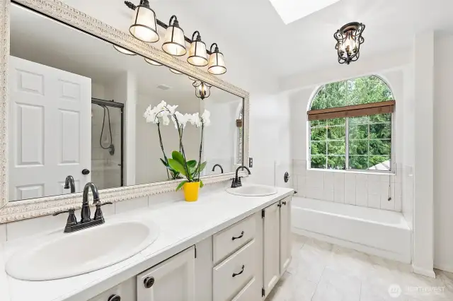 Natural light floods throughout this beautiful Primary Bath...