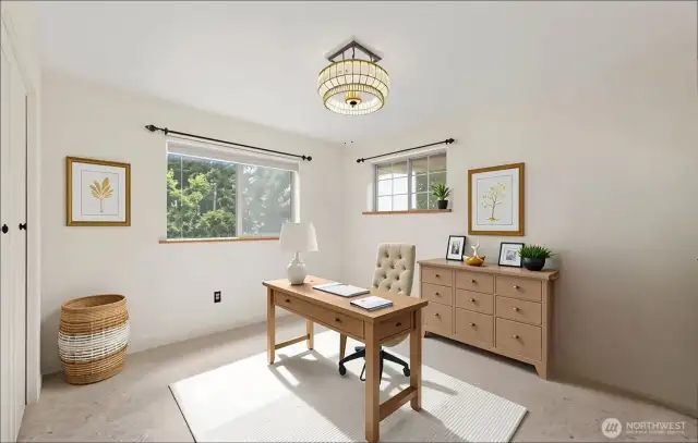 3rd Bedroom. Virtually Staged as office. Lots of natural light.