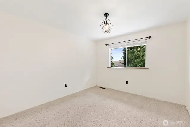 4th bedroom overlooking private backyard.