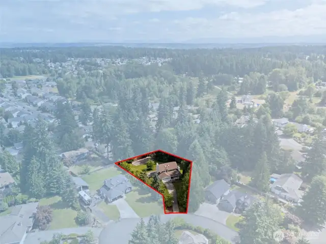 Map outline highlights the large and private .56 acre lot.