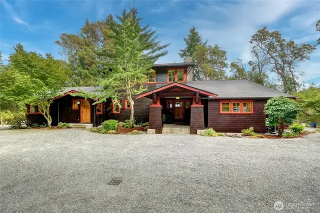 Ginko, Madrone, Maples of all kinds surround this beautiful home.