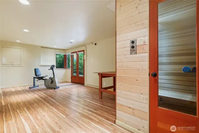 This space is adjacent to a storage room that could be converted to a kitchen or many other uses. This private space could be mother-in-law, private gym, art studio.....