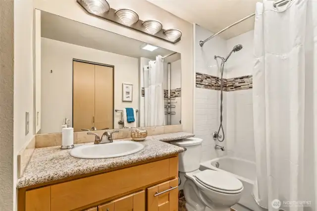 Granite and tile bathroom