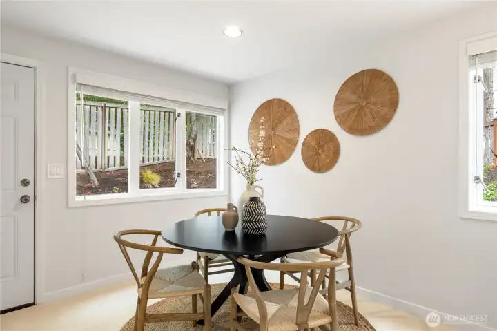 The dining area next to the kitchen also connects directly out to the back yard.