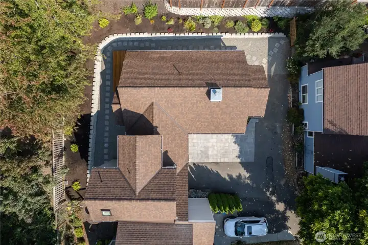 An aerial view of the home showing the exterior spaces.