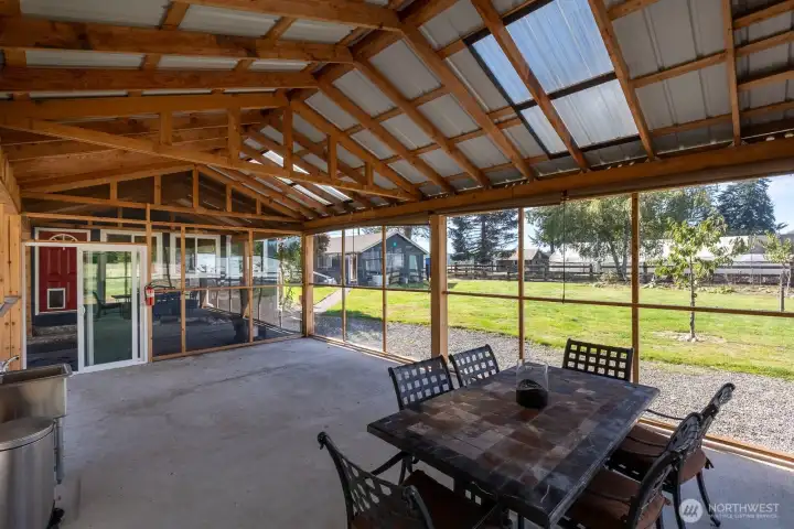 Stunning fully enclosed sunroom/ entertainment area.