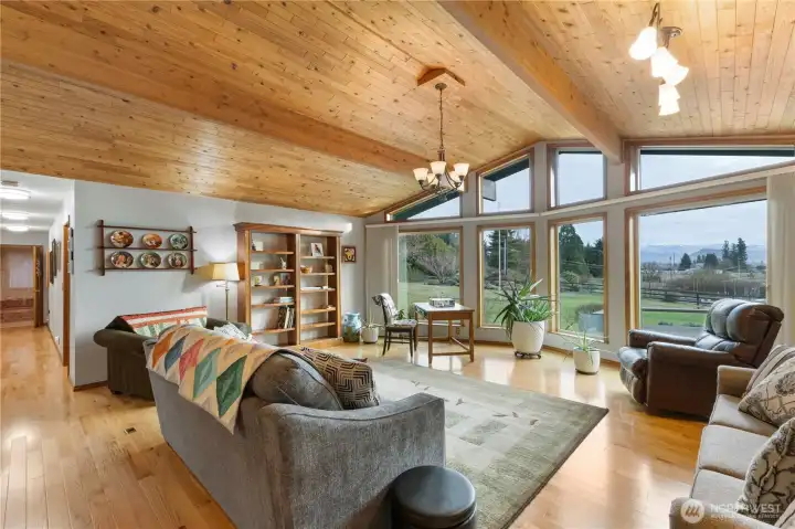 Newly updated windows throughout the home bring in abundant natural light while framing the incredible scenery.