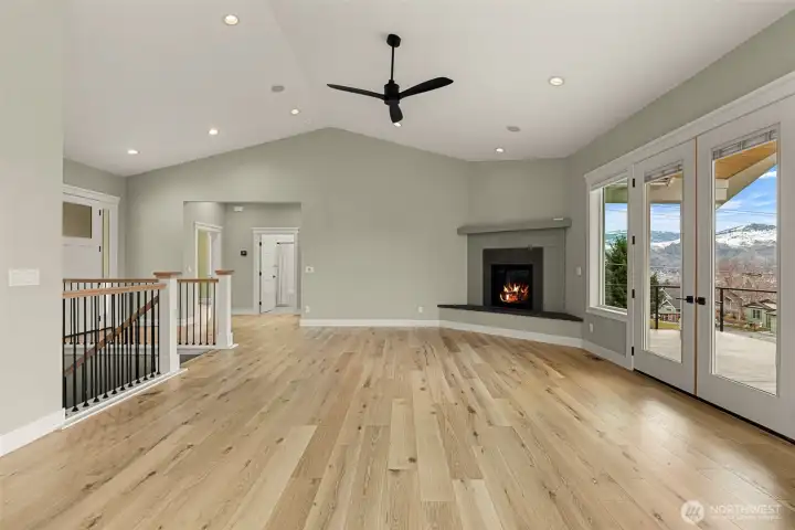 Abundant Natural Light, Soaring ceilings, wood flooring, Propane Fireplace