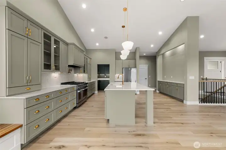 High end appliances with 7 burner propane stove &  2 ovens.