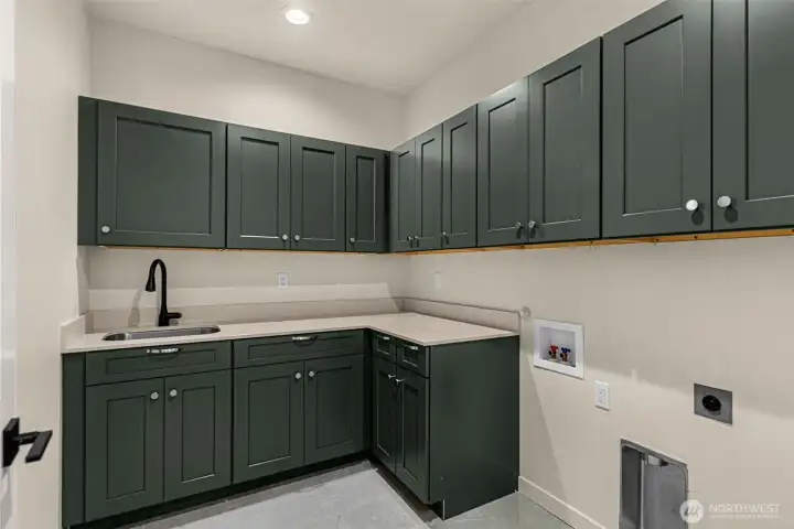 Laundry Room. Good storage, countertops, Sink Basin