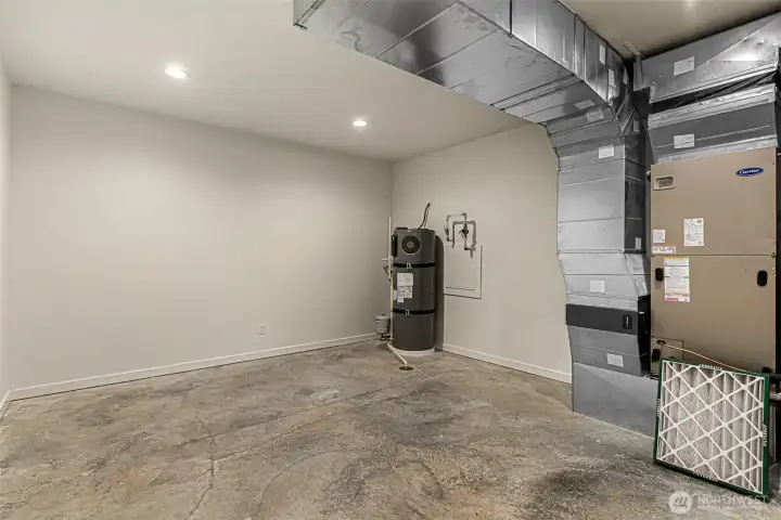 Lower Level Large mechanical room and storage.