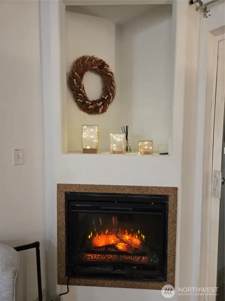 Electric fireplace with gas hook up.