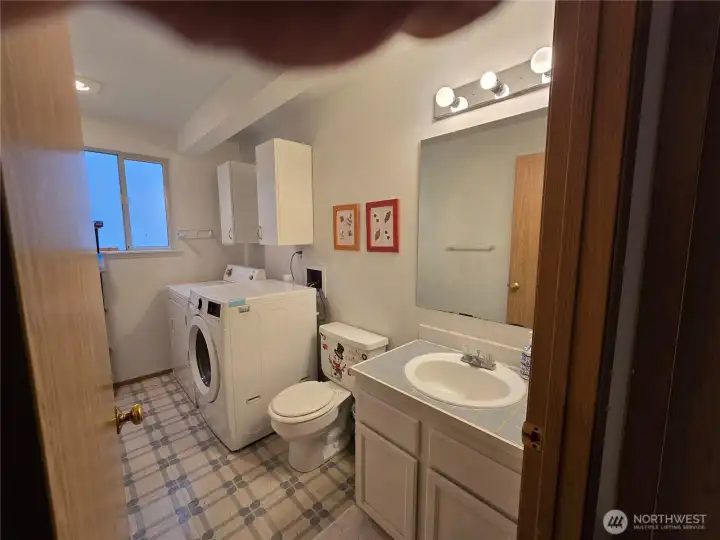 Laundry room and half bath.