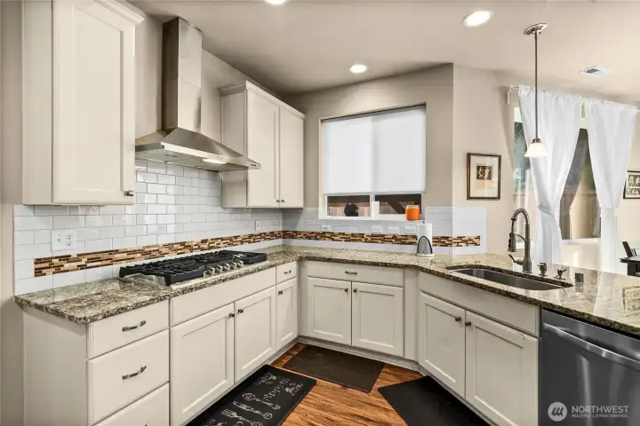 Granite counters and plenty of prep space