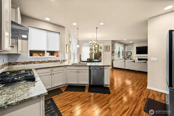 Stainless steel appliance in kitchen. New fridge and stove top