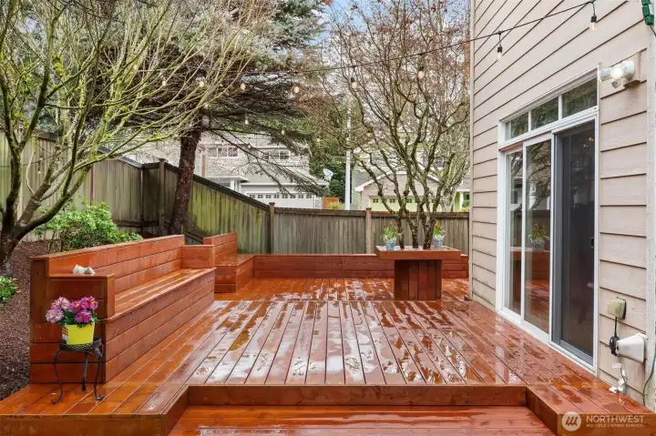 Wrap around deck with built in seating.