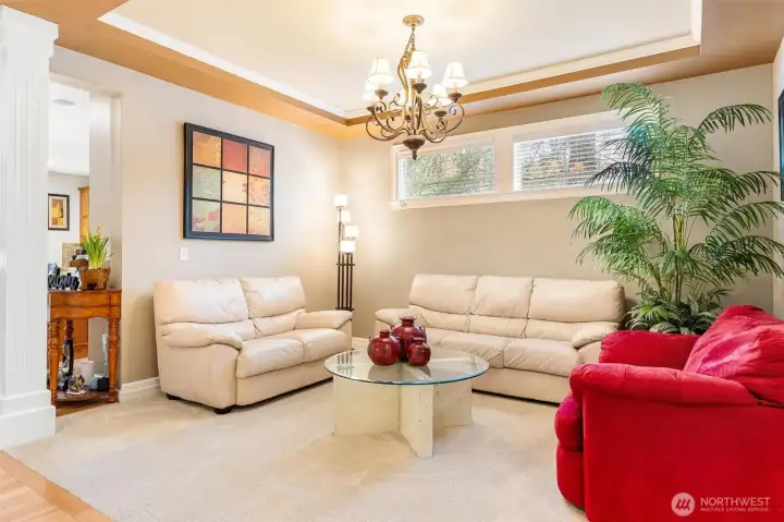 Formal dining room or as the seller has used the space as a cozy conversation corner.