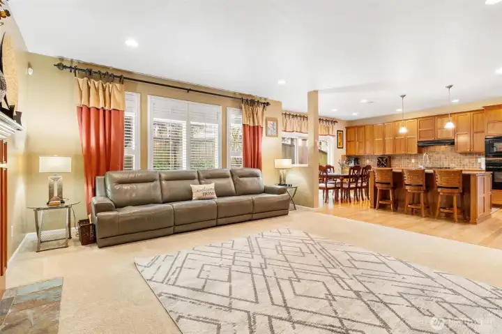 A true great room with custom wood shutters.