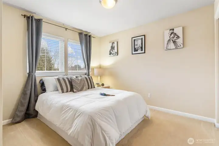 Bedroom facing the front of the house. Queen sized bed.