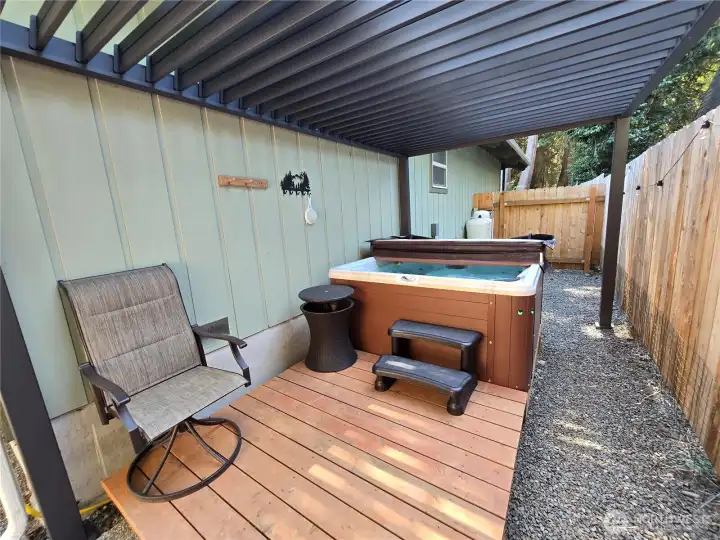 Covered Hot Tub Area with pergola and new deck