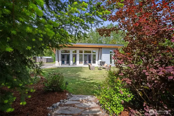 From the flower garden path to the front of the home.