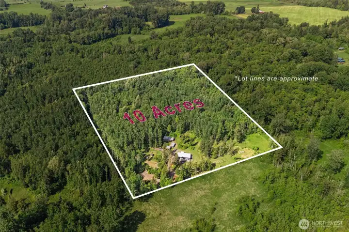 10 acres tucked away, yet minutes from amenities.