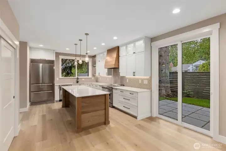 Kitchen open to dining and easy access to patio Kitchen open to dining and easy access to patio