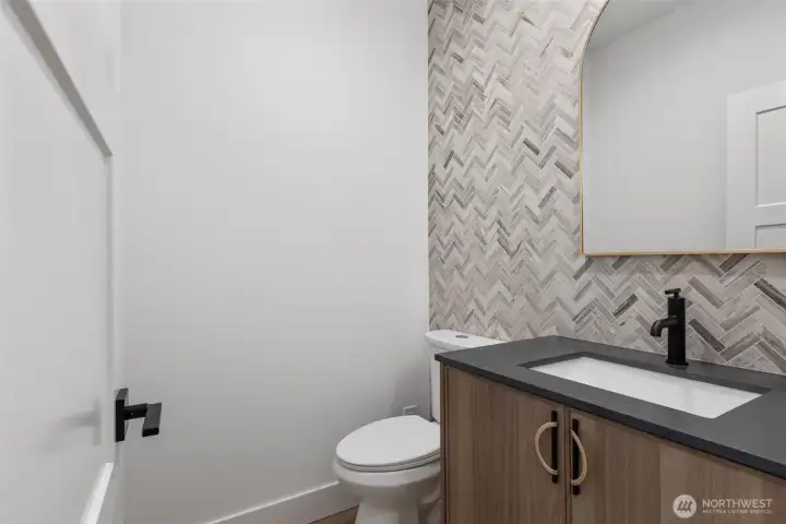Chic powder room off of entry Chic powder room off of entry